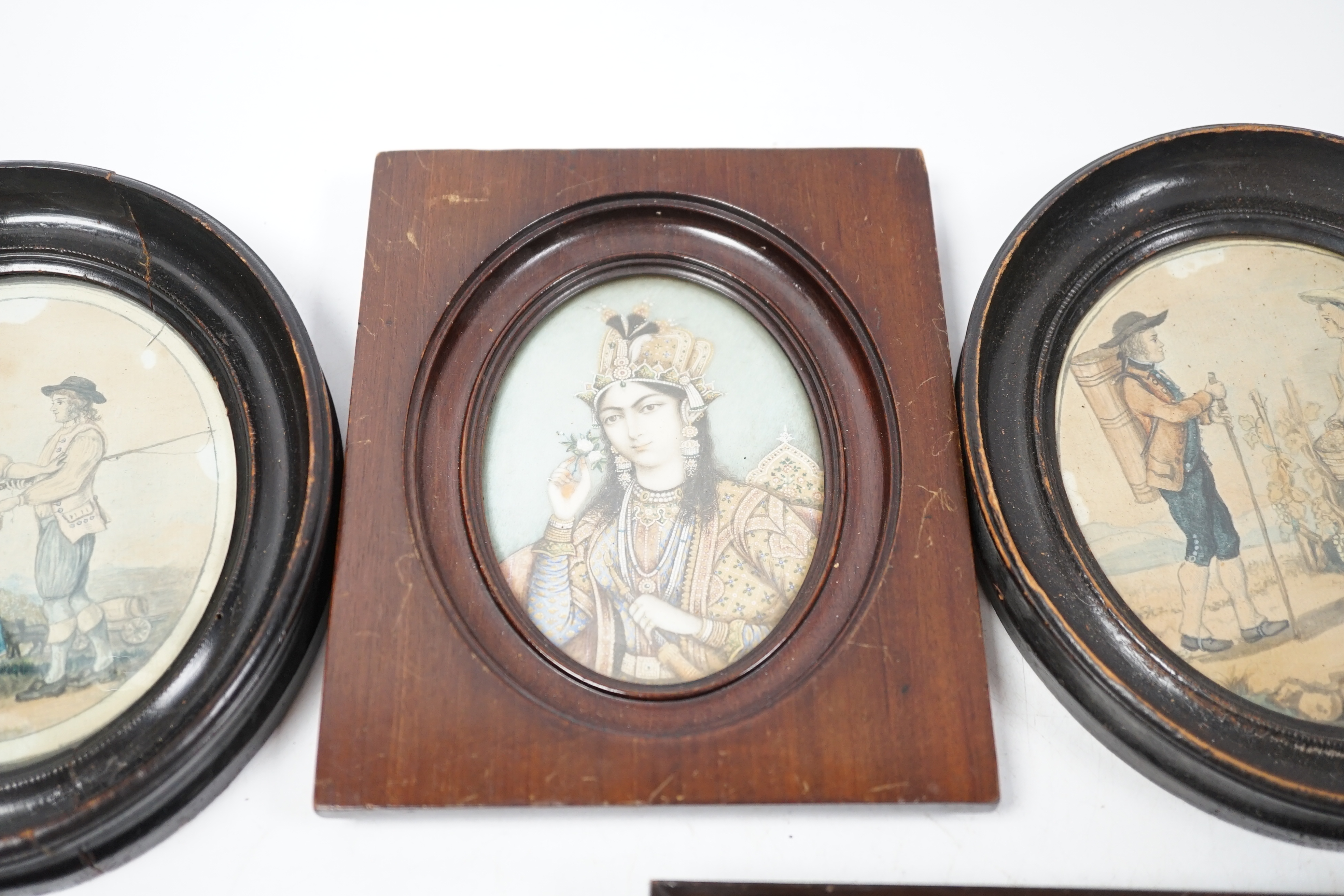 Five portrait miniatures comprising Indian watercolour on ivory, Portrait of a lady, two late 18th / early 19th century watercolours on card, Figures and two military style sepia prints, largest 12.5 x 10cm CITES Submiss